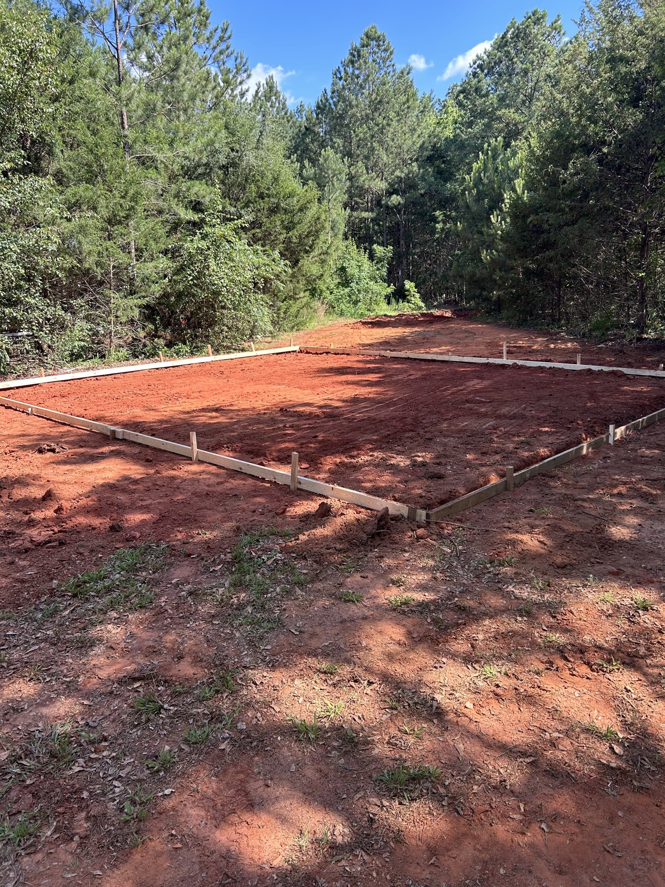 Graded concrete site preparation before forms and concrete pour