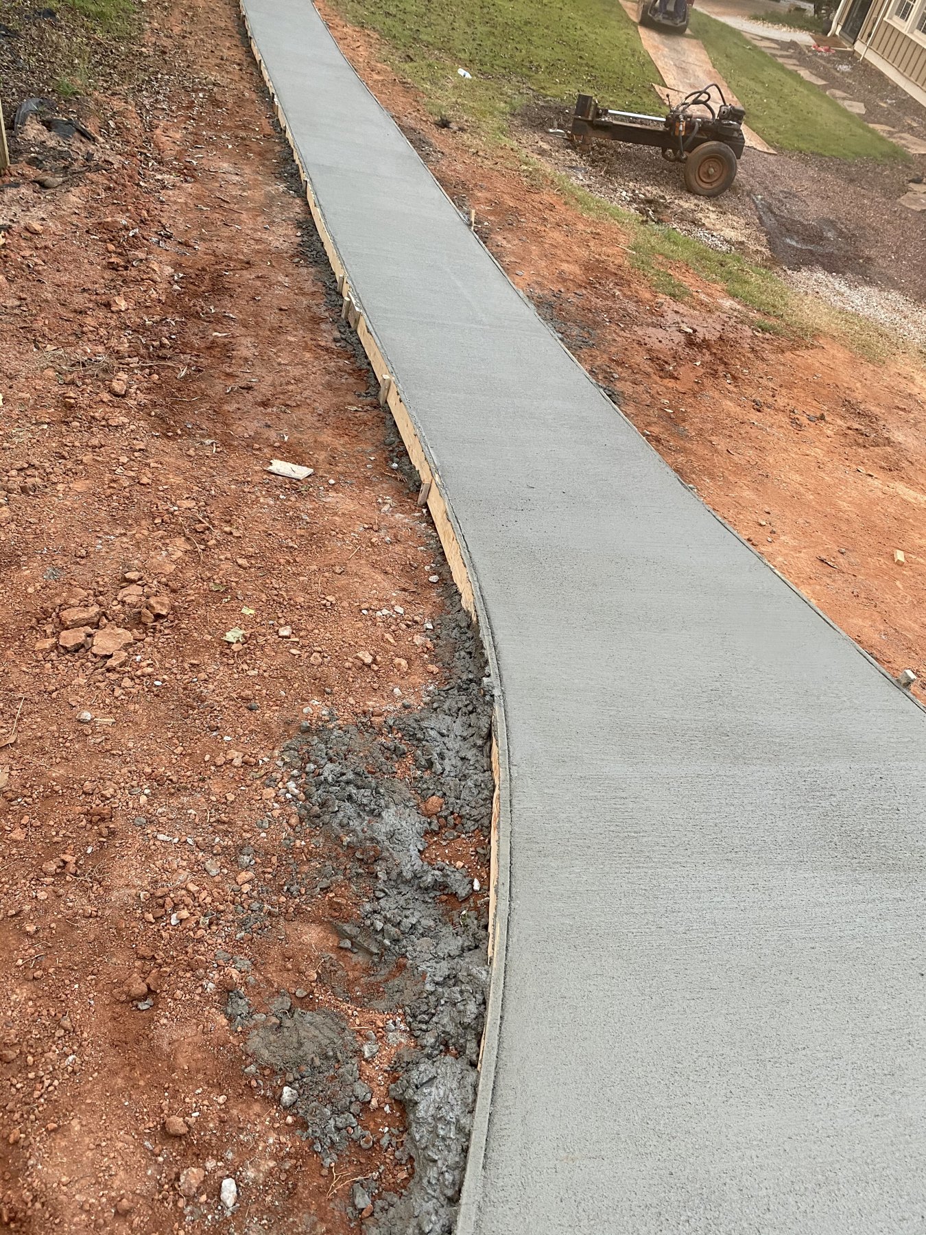 Curved walkway walkway concrete project completed by Colquitt Concrete in Georgia