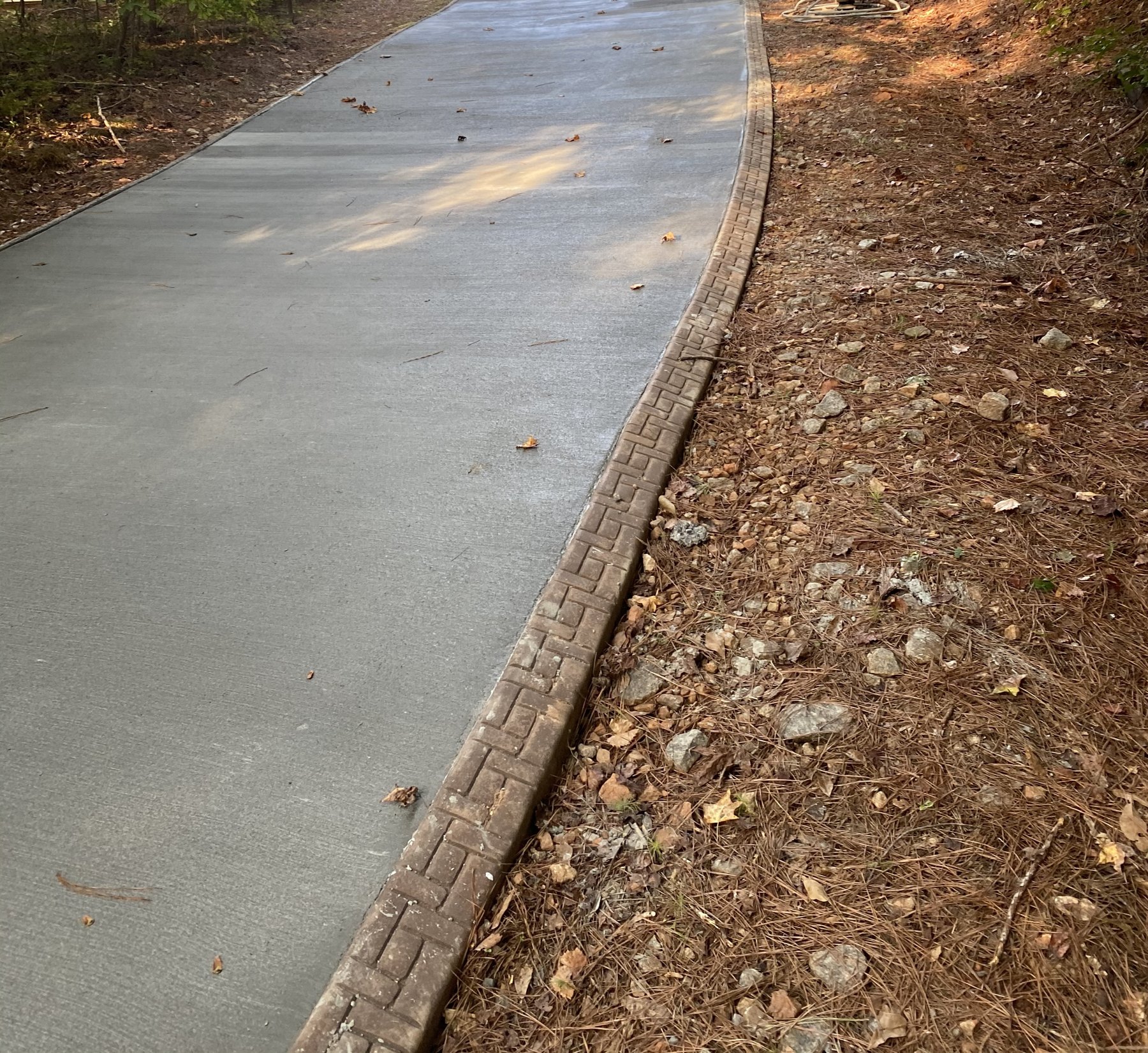 Curved walkway after photo 2 showing finished walkway concrete work by Colquitt Concrete in Georgia