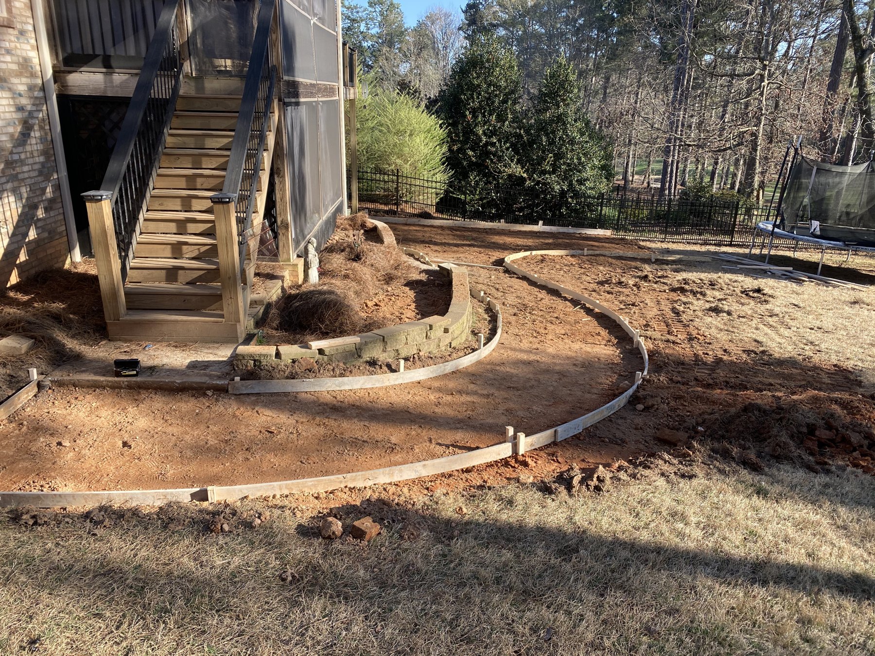 Curved walkway before photo 1 showing walkway concrete preparation by Colquitt Concrete in Georgia