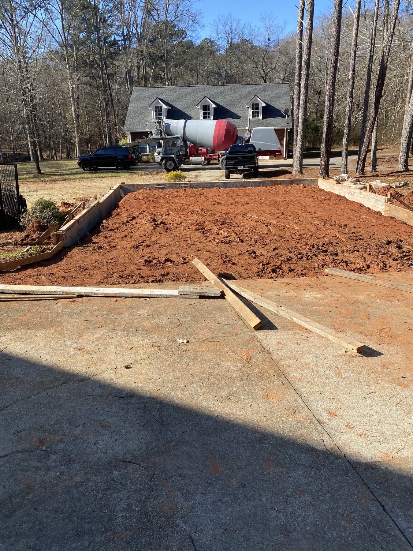 Large residential drive before photo 3 showing driveway concrete preparation by Colquitt Concrete in Georgia