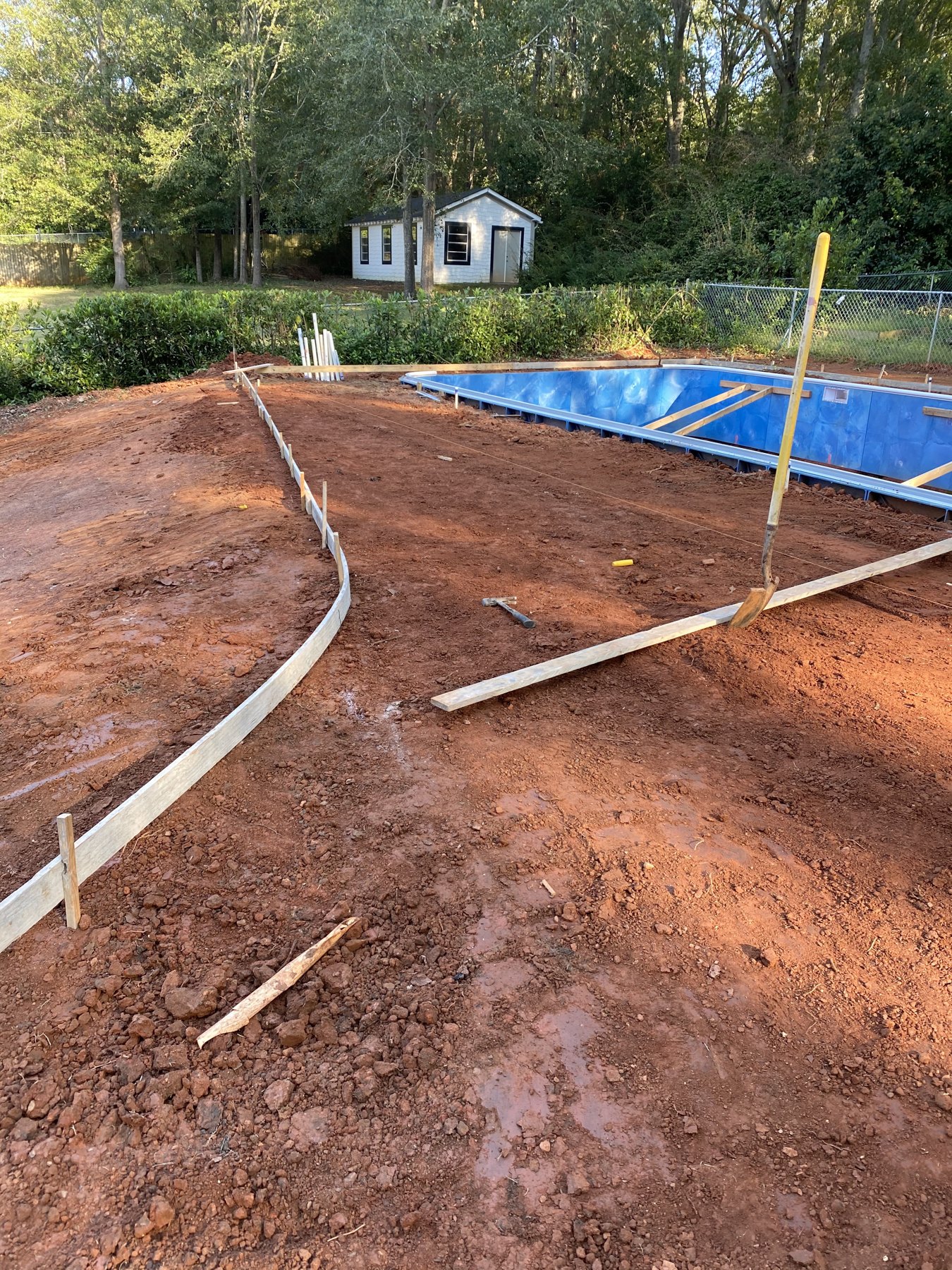 Pool deck extension before photo 1 showing pool deck concrete preparation by Colquitt Concrete in Georgia