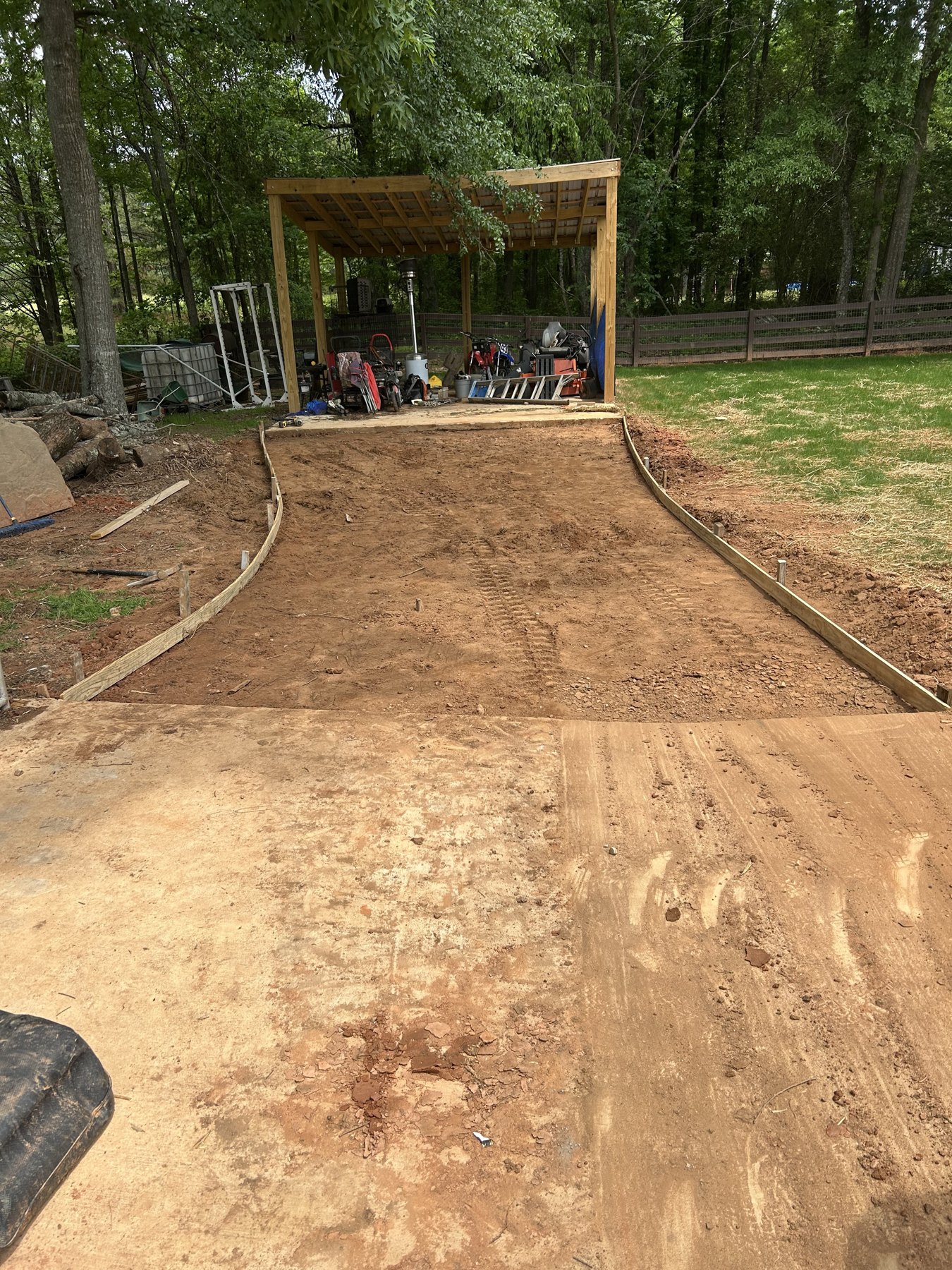 Rear patio and walk before photo 2 showing patio and walkway concrete preparation by Colquitt Concrete in Georgia