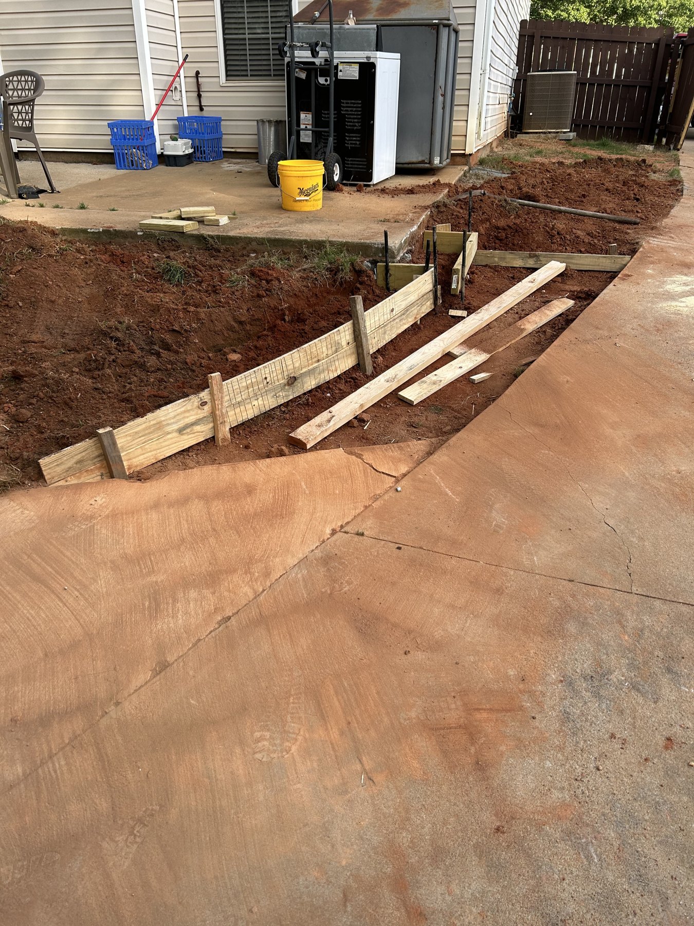 Rear patio and walk before photo 4 showing patio and walkway concrete preparation by Colquitt Concrete in Georgia
