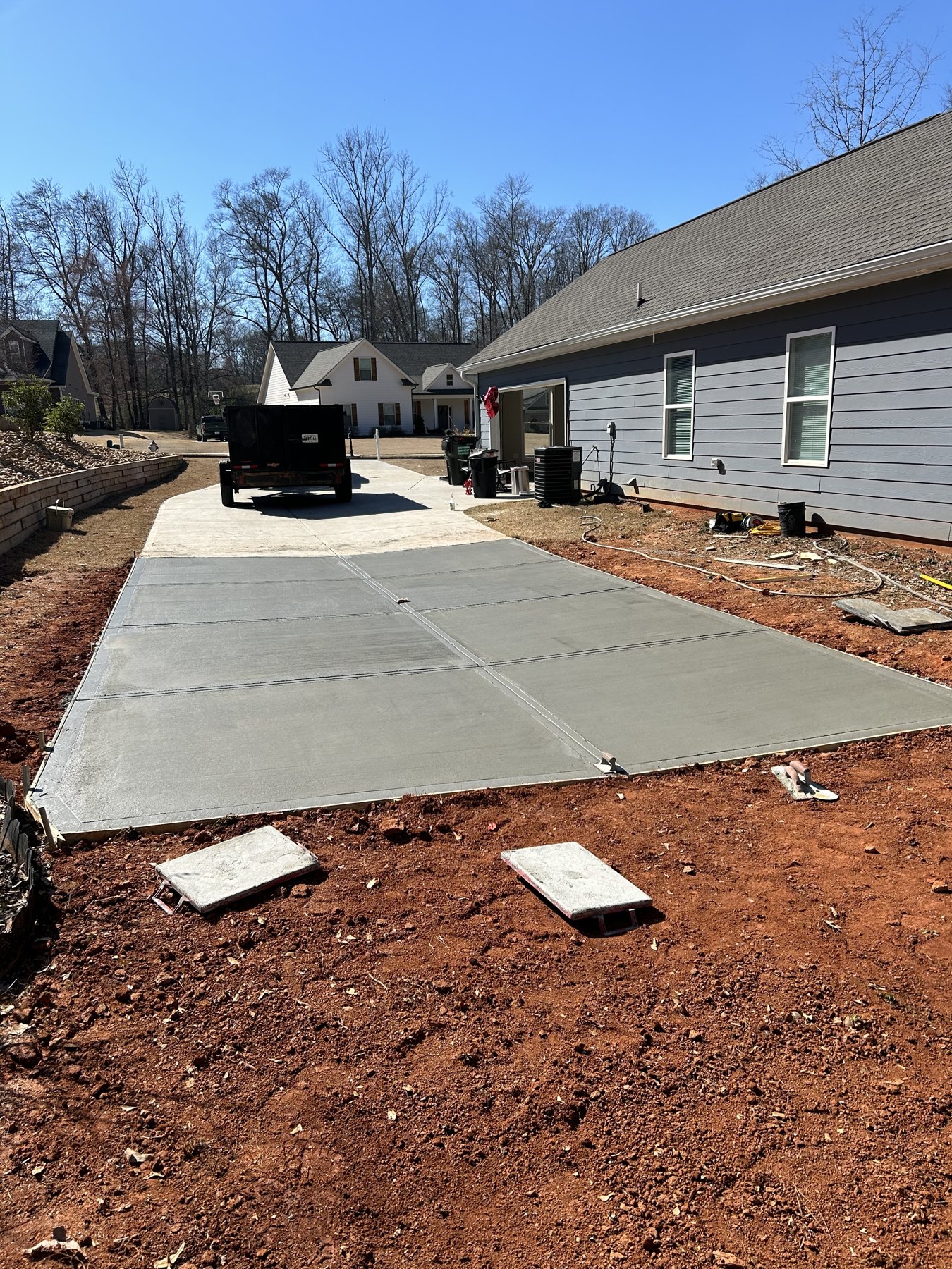 Side driveway extension after photo 4 showing finished driveway concrete work by Colquitt Concrete in Georgia