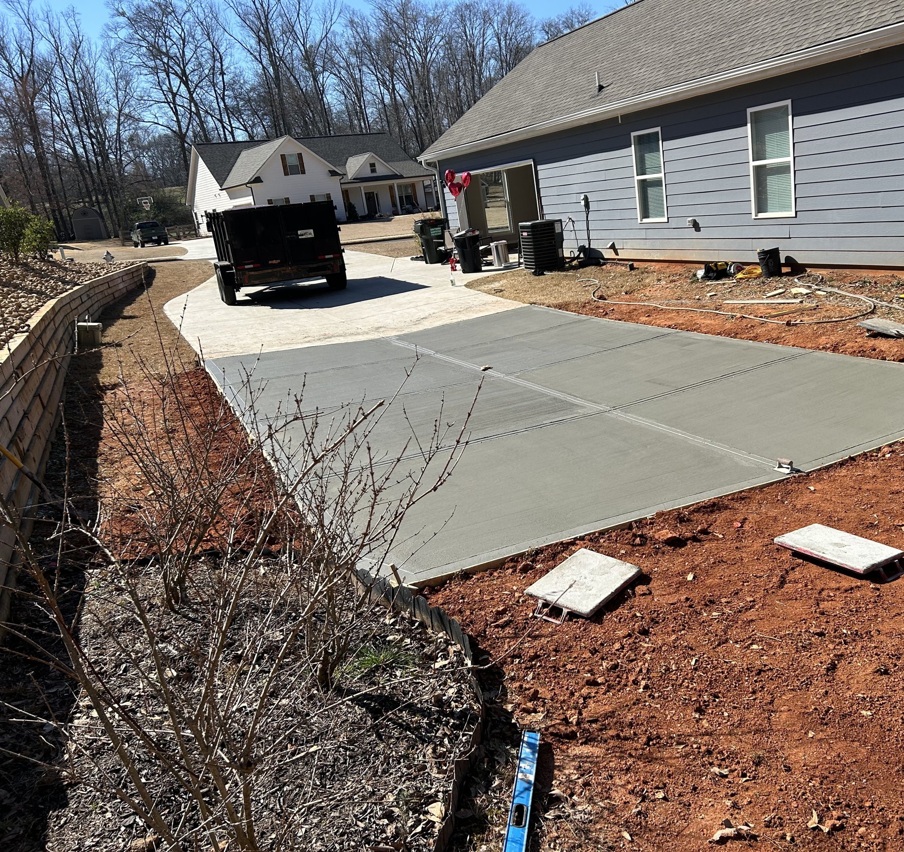 Side driveway extension after photo 5 showing finished driveway concrete work by Colquitt Concrete in Georgia