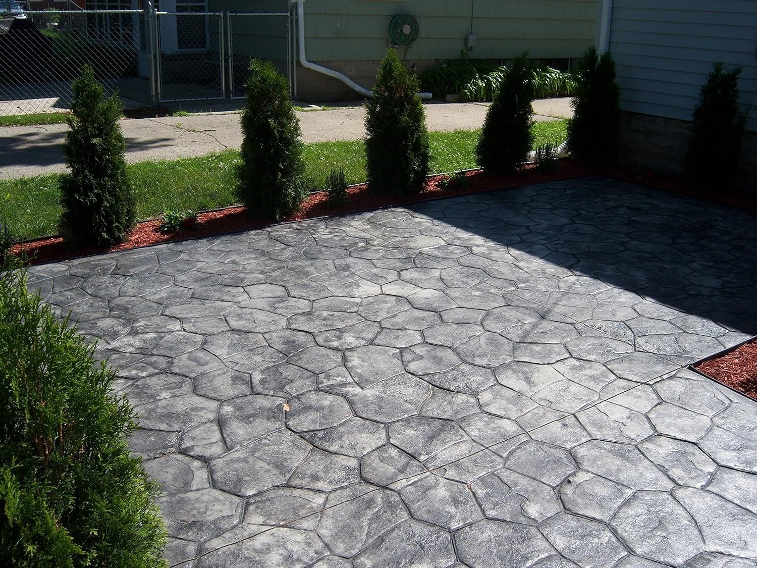 Stamped patio finish after photo 2 showing finished decorative concrete concrete work by Colquitt Concrete in Georgia