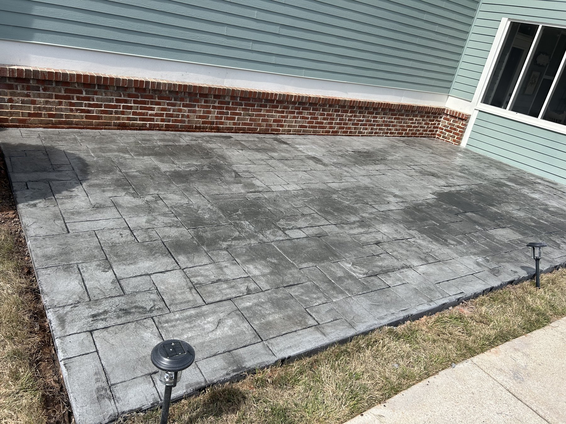 Stamped patio finish after photo 5 showing finished decorative concrete concrete work by Colquitt Concrete in Georgia
